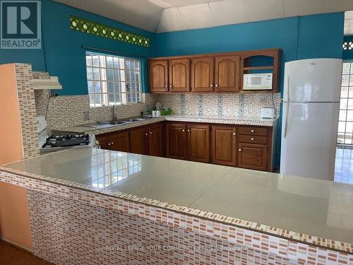 5 Gasparee Island, Trinidad, ON - Indoor Photo Showing Kitchen With Double Sink