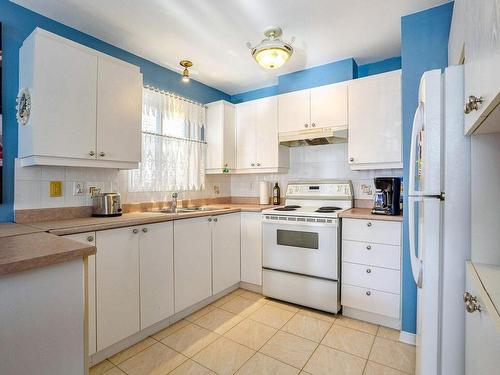 Cuisine - C-7201 Rue Chouinard, Montréal (Lasalle), QC - Indoor Photo Showing Kitchen With Double Sink