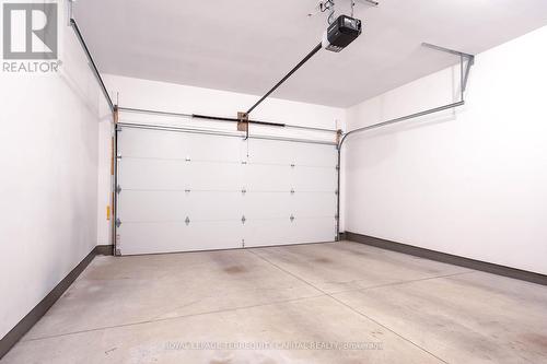 19 - 8974 Willoughby Drive, Niagara Falls, ON - Indoor Photo Showing Garage