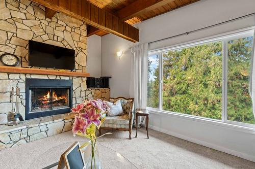 2190 Okanagan Avenue, Salmon Arm, BC - Indoor Photo Showing Living Room With Fireplace