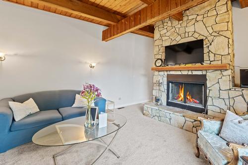 2190 Okanagan Avenue, Salmon Arm, BC - Indoor Photo Showing Living Room With Fireplace