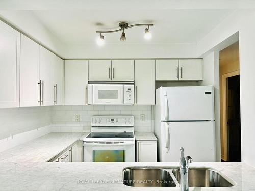 311-212 Eglinton Ave E, Toronto, ON - Indoor Photo Showing Kitchen With Double Sink