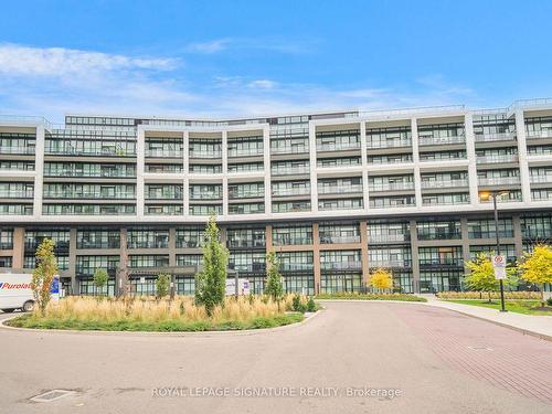 202-50 George Butchart Dr, Toronto, ON - Outdoor With Balcony With Facade