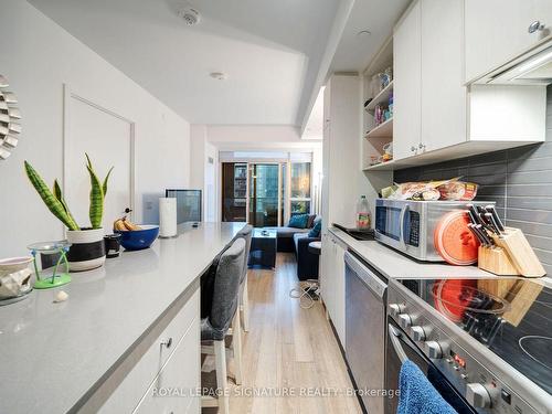 202-50 George Butchart Dr, Toronto, ON - Indoor Photo Showing Kitchen