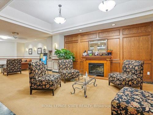 511-7 Gale Cres, St. Catharines, ON - Indoor Photo Showing Living Room With Fireplace