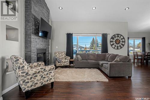 206 2Nd Avenue, Hanley, SK - Indoor Photo Showing Living Room With Fireplace