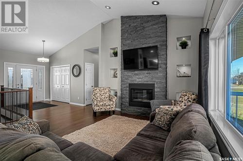 206 2Nd Avenue, Hanley, SK - Indoor Photo Showing Living Room With Fireplace