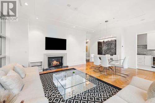 2503 - 183 Wellington Street W, Toronto, ON - Indoor Photo Showing Living Room With Fireplace