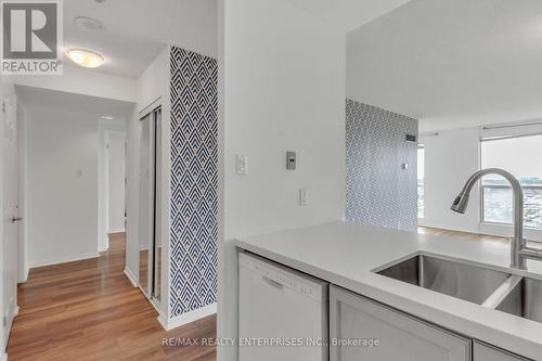 711 - 2177 Burnhamthorpe Road W, Mississauga, ON - Indoor Photo Showing Kitchen With Double Sink