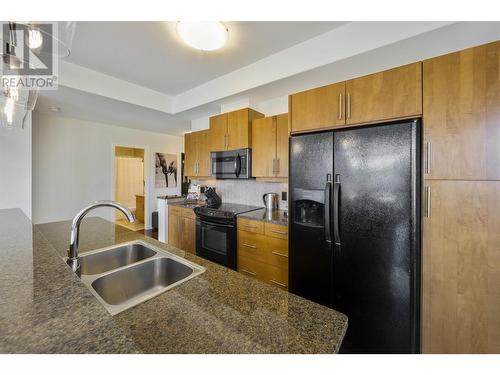 1933 Ambrosi Road Unit# 406, Kelowna, BC - Indoor Photo Showing Kitchen With Double Sink