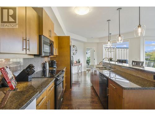 1933 Ambrosi Road Unit# 406, Kelowna, BC - Indoor Photo Showing Kitchen With Double Sink With Upgraded Kitchen