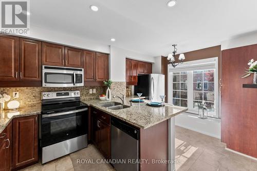 3240 Redpath Circle, Mississauga, ON - Indoor Photo Showing Kitchen With Double Sink