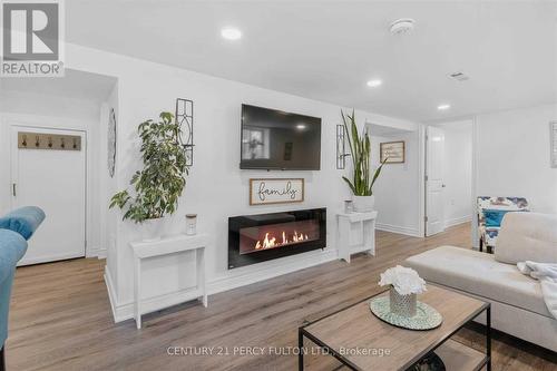 Bsmt - 1182 Ravine Road, Oshawa, ON - Indoor Photo Showing Living Room With Fireplace