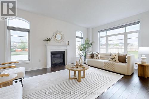 1 Kenneth Ross Bend, East Gwillimbury, ON - Indoor Photo Showing Living Room With Fireplace