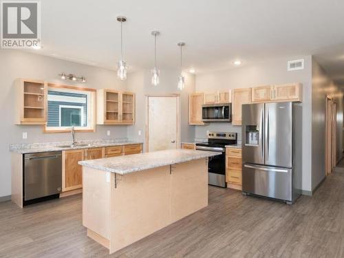 22 Beryl Place, Whitehorse, YT - Indoor Photo Showing Kitchen With Stainless Steel Kitchen With Upgraded Kitchen