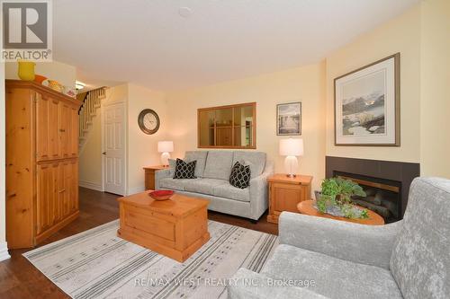 35 - 18 Hartnell Square, Brampton, ON - Indoor Photo Showing Living Room With Fireplace