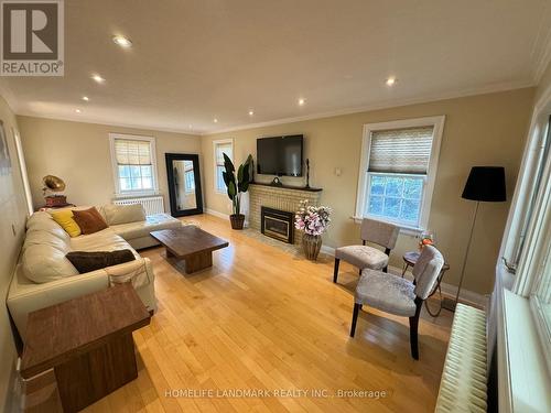 174 Steeles Avenue E, Markham, ON - Indoor Photo Showing Living Room With Fireplace