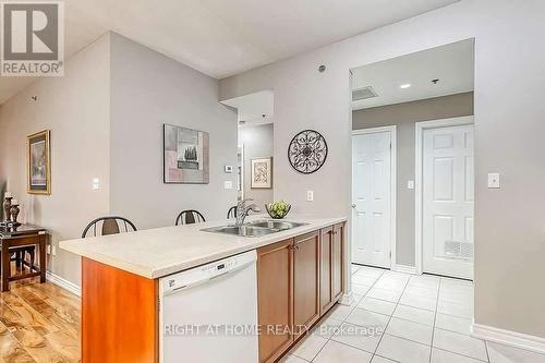 305 - 391 Plains Road E, Burlington, ON - Indoor Photo Showing Kitchen With Double Sink