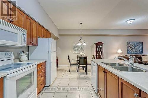 305 - 391 Plains Road E, Burlington, ON - Indoor Photo Showing Kitchen With Double Sink