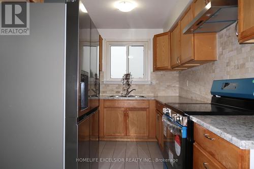 713 Bayla Court, Oshawa, ON - Indoor Photo Showing Kitchen With Double Sink