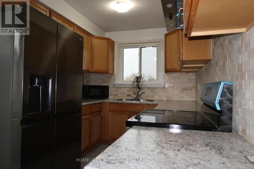 713 Bayla Court, Oshawa, ON - Indoor Photo Showing Kitchen With Double Sink