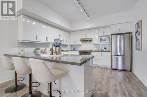 B105 - 99 South Town Centre Boulevard, Markham, ON - Indoor Photo Showing Kitchen With Upgraded Kitchen