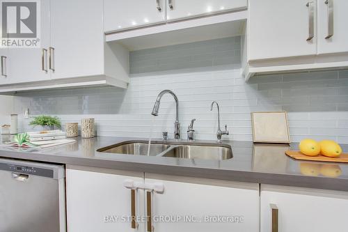 B105 - 99 South Town Centre Boulevard, Markham, ON - Indoor Photo Showing Kitchen With Double Sink