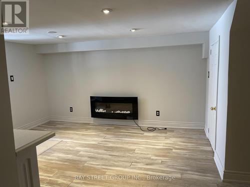 Base - 19447 Yonge Street, East Gwillimbury, ON - Indoor With Fireplace