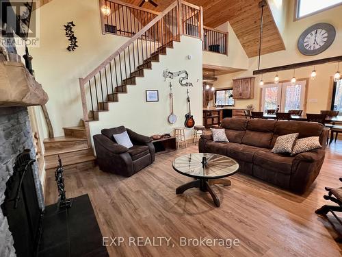 1249 Waters Edge Lane, Central Frontenac, ON - Indoor Photo Showing Living Room With Fireplace