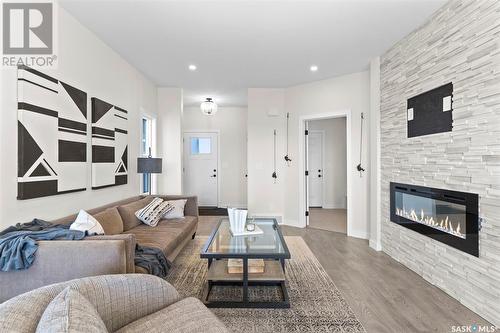 174 Kostiuk Crescent, Saskatoon, SK - Indoor Photo Showing Living Room With Fireplace