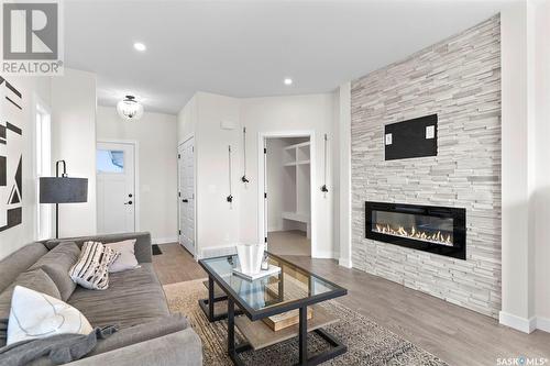 174 Kostiuk Crescent, Saskatoon, SK - Indoor Photo Showing Living Room With Fireplace