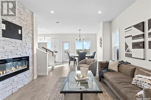 174 Kostiuk Crescent, Saskatoon, SK - Indoor Photo Showing Living Room With Fireplace