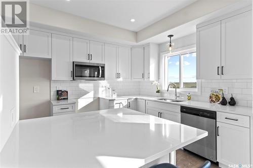 174 Kostiuk Crescent, Saskatoon, SK - Indoor Photo Showing Kitchen With Upgraded Kitchen