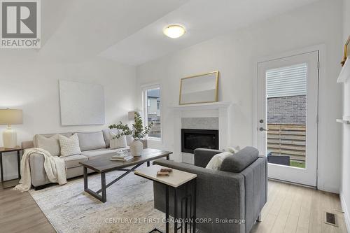 71 - 2040 Shore Road, London, ON - Indoor Photo Showing Living Room With Fireplace