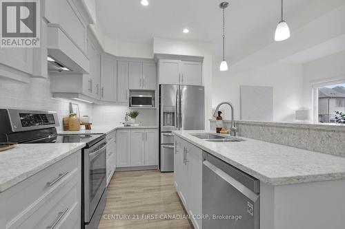 71 - 2040 Shore Road, London, ON - Indoor Photo Showing Kitchen With Stainless Steel Kitchen With Double Sink With Upgraded Kitchen