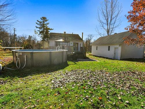 Backyard - 364 Côte St-Paul, Saint-Colomban, QC - Outdoor With Above Ground Pool With Backyard