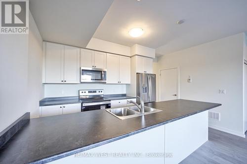 201 - 160 Densmore Road, Cobourg, ON - Indoor Photo Showing Kitchen With Double Sink