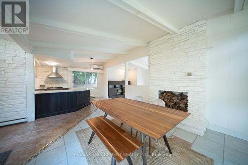 122 Balmoral Drive, Brantford, ON - Indoor Photo Showing Dining Room With Fireplace