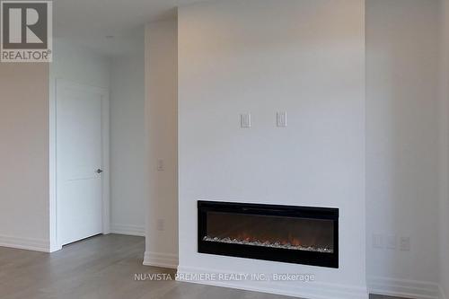 611 - 480 Callaway Road, London, ON - Indoor Photo Showing Living Room With Fireplace