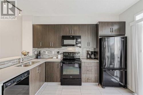 118 Walden Circle Se, Calgary, AB - Indoor Photo Showing Kitchen With Double Sink