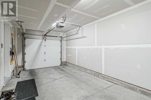 118 Walden Circle Se, Calgary, AB - Indoor Photo Showing Garage