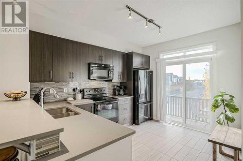 118 Walden Circle Se, Calgary, AB - Indoor Photo Showing Kitchen With Double Sink