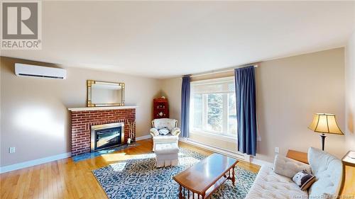 9 Pinewood Crescent, Quispamsis, NB - Indoor Photo Showing Living Room With Fireplace