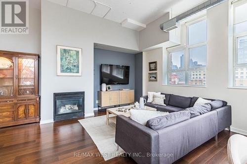 821 - 155 Dalhousie Street, Toronto, ON - Indoor Photo Showing Living Room With Fireplace