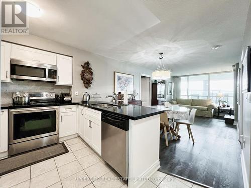 309 - 60 Brian Harrison Way, Toronto, ON - Indoor Photo Showing Kitchen With Stainless Steel Kitchen