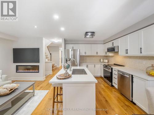 4 Sarno Street, Vaughan, ON - Indoor Photo Showing Kitchen With Fireplace