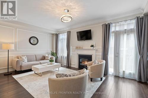 20 Verbena Street, East Gwillimbury, ON - Indoor Photo Showing Living Room With Fireplace