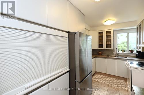 131 - 3040 Constitution Boulevard, Mississauga, ON - Indoor Photo Showing Kitchen With Double Sink