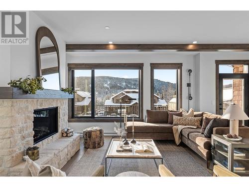 7000 Mcgillivray Lake Drive Unit# 4, Sun Peaks, BC - Indoor Photo Showing Living Room With Fireplace