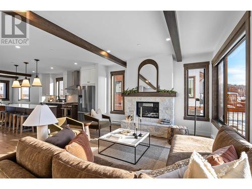 7000 Mcgillivray Lake Drive Unit# 4, Sun Peaks, BC - Indoor Photo Showing Living Room With Fireplace